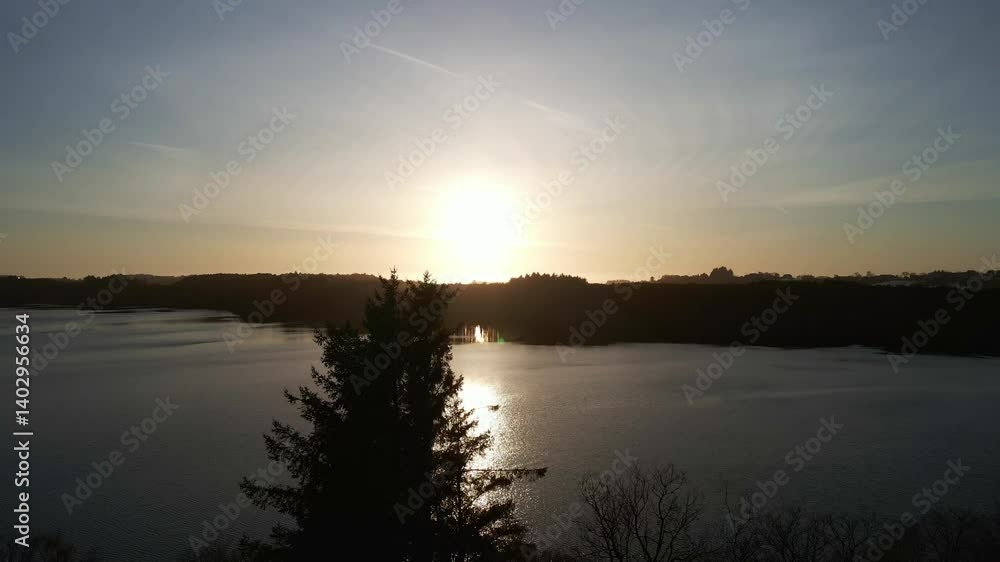 Aerial Drone Shot Over Stokkavannet Lake At Dawn With Calm Waters And Soft Morning Light Aerial Drone Shot Over Stokkavannet Lake At Dawn With Calm Waters And Soft Morning Light