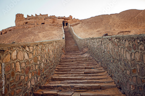West Bank with Tombs of the Nobles from the Old and Middle Kingdom.  There is Qubbet el-Hawa - Dome of the Winds'at the crest of the hill.