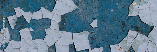 Obraz na płótnie Peeling paint on the wall. Panorama of a concrete wall with old cracked flaking paint. Weathered rough painted surface with patterns of cracks and peeling. Panoramic texture for background and design. w salonie
