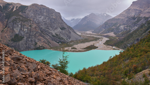 Lake Verde in Jeinimeni - Aviles trail in the Patagonia National Park, Chile. Landscape beauty of mountains, forests, rivers, lakes and valleys. Turquoise water. Autumn colors.