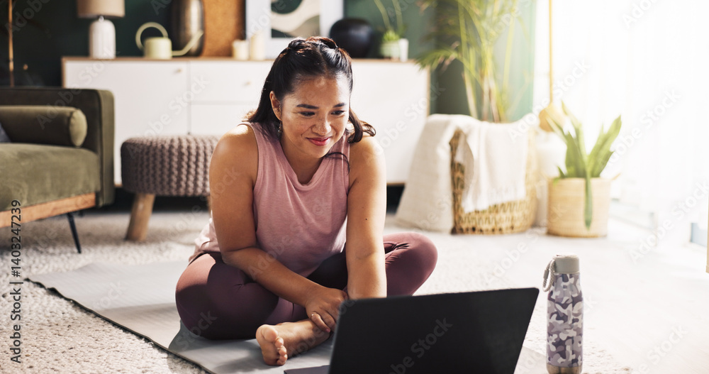 Happy, asian woman and yoga with laptop for online class, tutorial or zen workout on floor at home. Female person, yogi or fitness with computer or app for mindfulness, awareness or balance at house