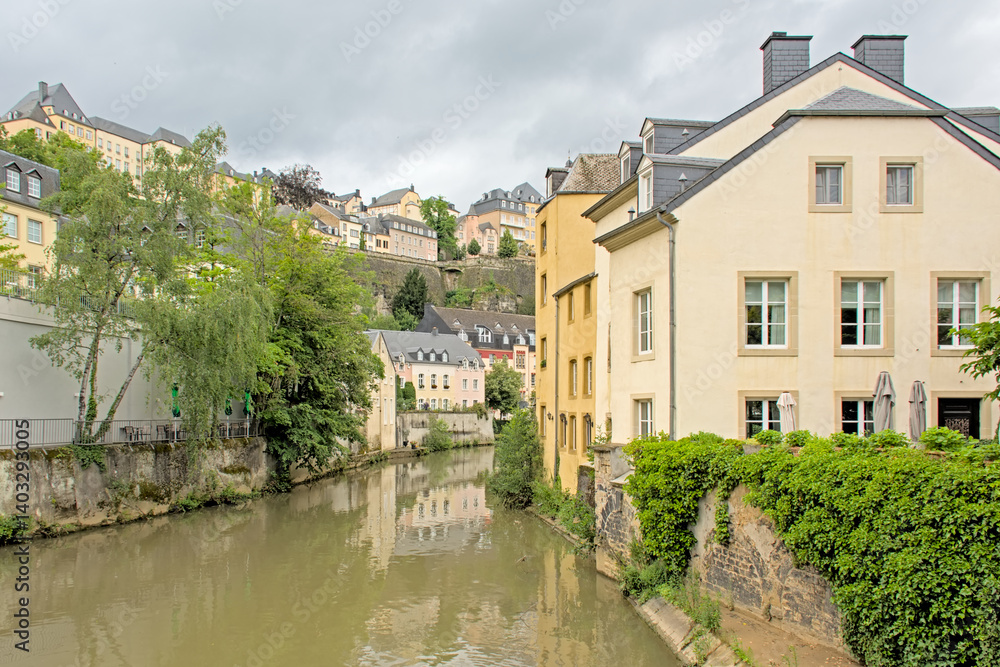 Fototapeta premium River Alzette along historical houses in the city of Luxembourg 