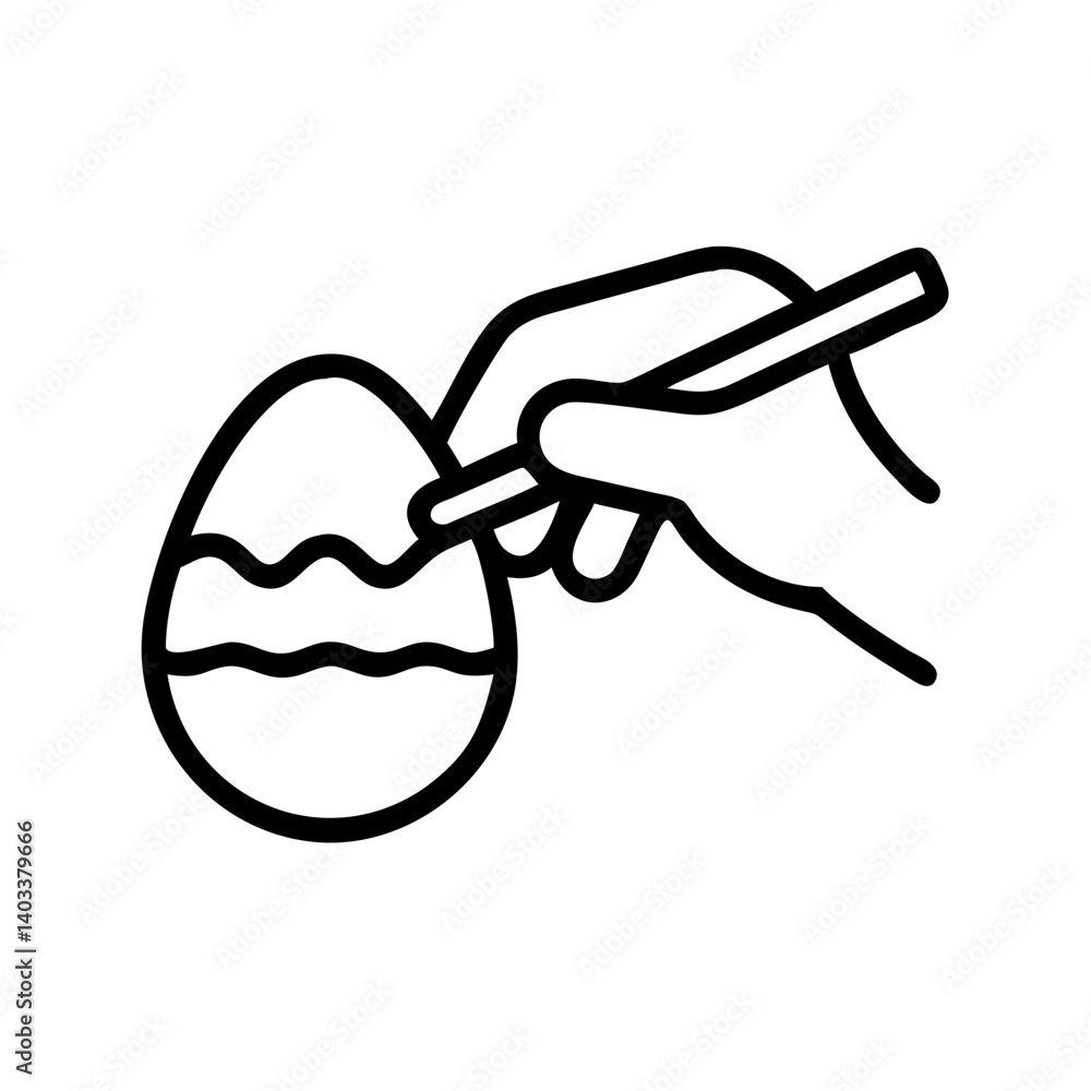 Hand Painting an Easter Egg with a Brush Hand Painting an Easter Egg with a Brush