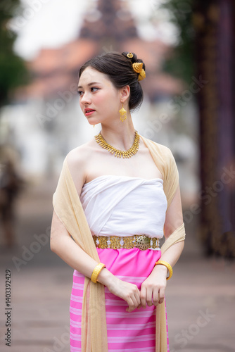 Obraz na płótnie Young asian woman Thai traditional costume dress, Asian women dress identity Thai culture national costume culture dress, Thai traditional costume Thailand National, Thai woman culture costume dress. w salonie