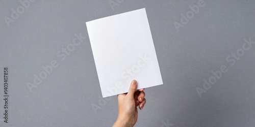 Wallpaper Mural A hand outstretched with a blank white sheet on a white background Torontodigital.ca