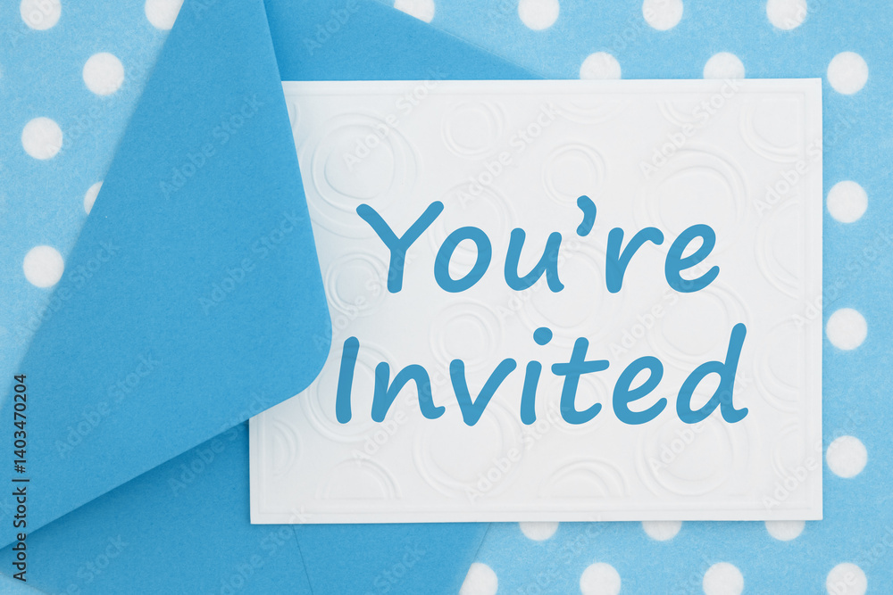You are invited card on blue polka dots material
