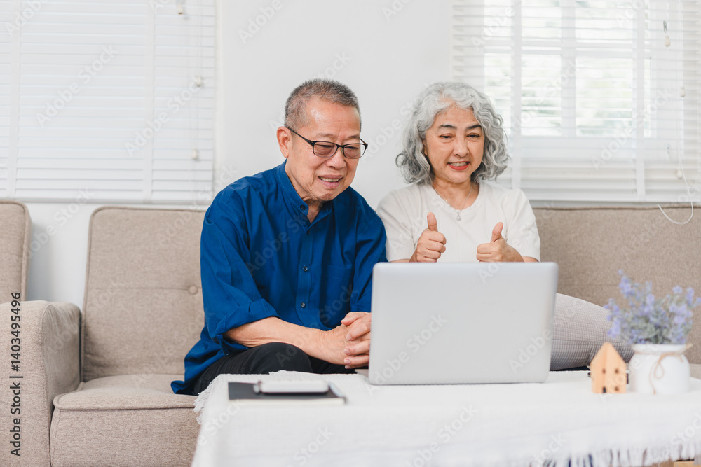 Elderly couple having cheerful online video call with doctor on laptop while sitting on cozy sofa at home Elderly couple having cheerful online video call with doctor on laptop while sitting on cozy sofa at home