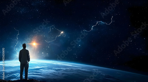 Silhouette Of A Person Standing On The Edge Of Planet Earth Looking At The Stars