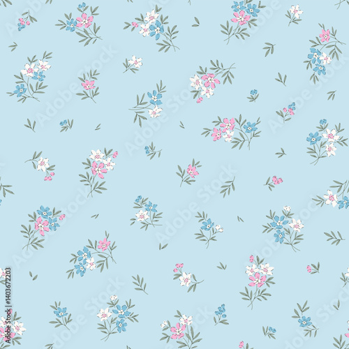 Cute floral pattern in small flowers. Small white, blue and pink flowers. Light blue background. Ditsy print. Floral seamless background. Ditsy template for fashion prints. Stock pattern.