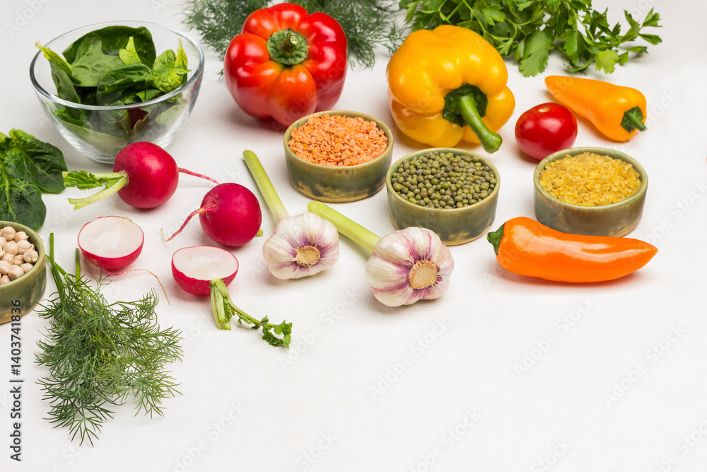 Cereals, vegetables and greens on table. Mash, lentils, bulgur in bowls.