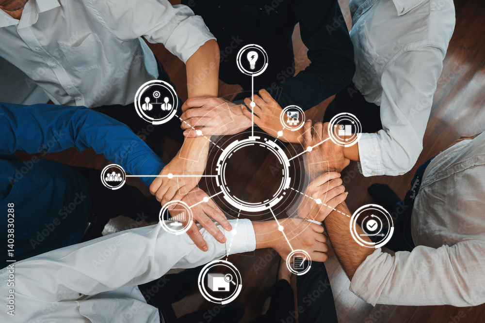 A diverse group of individuals connects their hands together, symbolizing unity and teamwork, surrounded by digital icons representing collaboration and innovation in a professional context. Amity