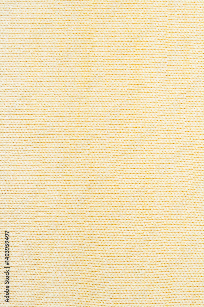 Fototapeta premium Sweater or scarf fabric texture large knitting. Knitted jersey background with a relief pattern. Wool hand- machine, handmade, yellow.
