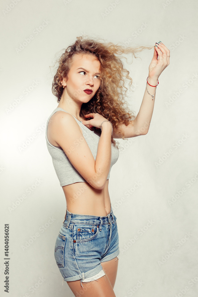 Beauty young woman with curly big and long hair. Beauty young woman with curly big and long hair.
