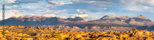 Obraz na płótnie Petrified Dunes and La Sal mountain range panorama in Arches National Park, Utah. The formations were produced when ancient sand dunes hardened into stone. w salonie