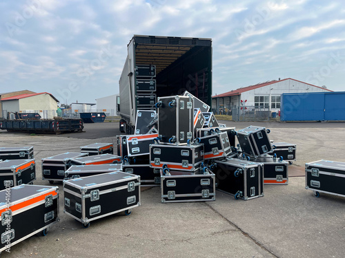 Loading or Unloading incident: road cases fell off a truck trailer at an industrial site