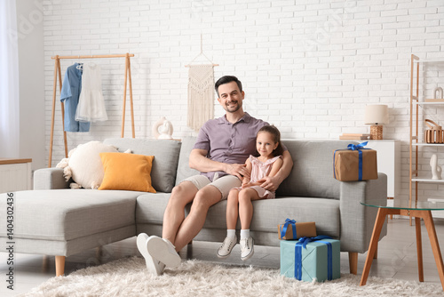 Father and daughter sitting...