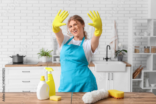 Female janitor with rubber ...