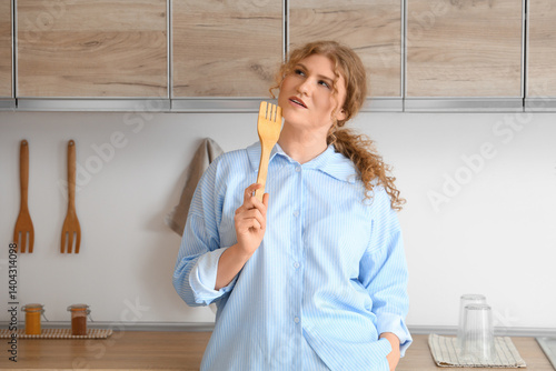 Thoughtful young woman with...