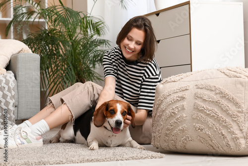Young woman sitting on floo...