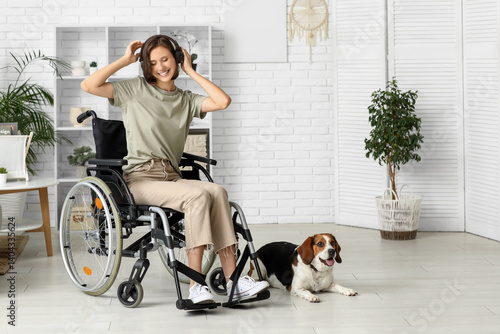 Happy young woman in wheelc...