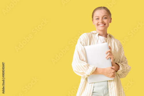 Young woman with modern lap...