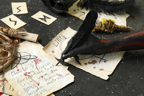 Bloody witch hand with magi...