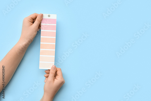 Female hands with paint col...