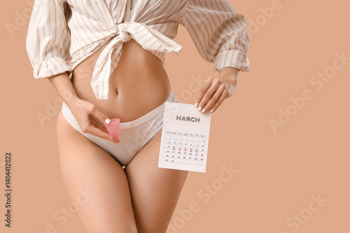 Young woman with menstrual ...