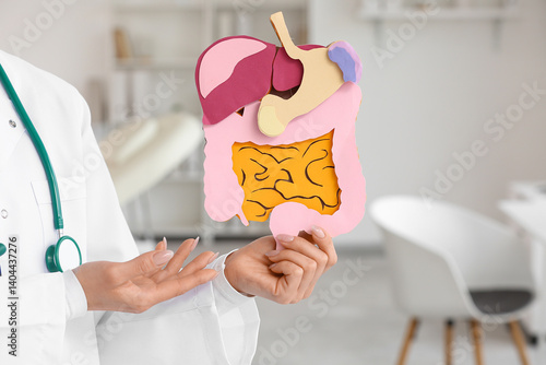 Female doctor with paper di...