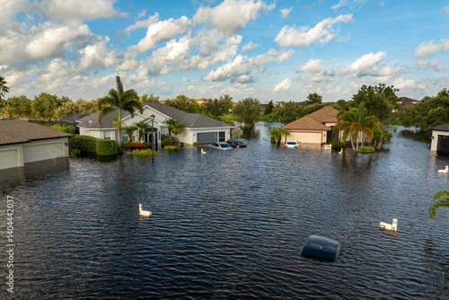 Obraz na plátně Hurricane flooded cars and homes in residential community in Florida, USA