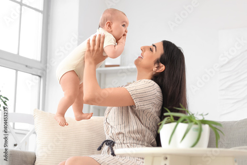 Happy mother with her littl...