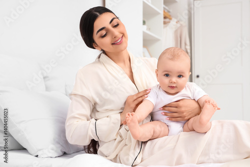 Happy mother with her littl...