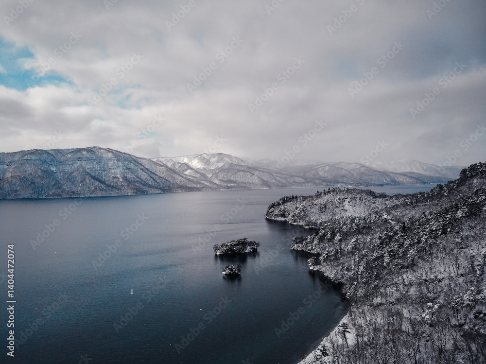 Obraz premium Aerial photography of Lake Towada in winter in Aomori Prefecture, Japan