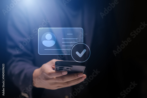 human hand holding digital identification card, with Checkmark Icons for Identity verification, ID card with checkmark. Personality approve. Employee badge.