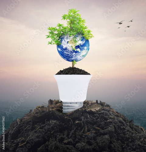 Fototapeta Naklejka Na Ścianę i Meble -  Earth with tree on soil with light bulb over city tower and skyscraper at sunset sky, vintage style, Save the earth concept, Elements of this image furnished by NASA