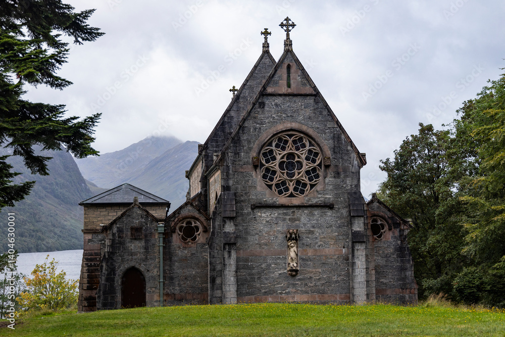St Mary and St Finnan Church rises above the shores of Loch Shiel, near the Glenfinnan Viaduct. A Gothic gem nestled in the wild landscape of the Scottish Highlands. St Mary and St Finnan Church rises above the shores of Loch Shiel, near the Glenfinnan Viaduct. A Gothic gem nestled in the wild landscape of the Scottish Highlands.