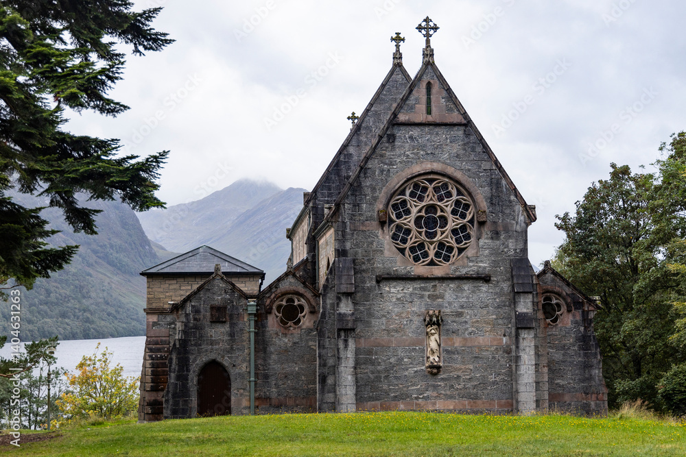St Mary and St Finnan Church rises above the shores of Loch Shiel, near the Glenfinnan Viaduct. A Gothic gem nestled in the wild landscape of the Scottish Highlands. St Mary and St Finnan Church rises above the shores of Loch Shiel, near the Glenfinnan Viaduct. A Gothic gem nestled in the wild landscape of the Scottish Highlands.