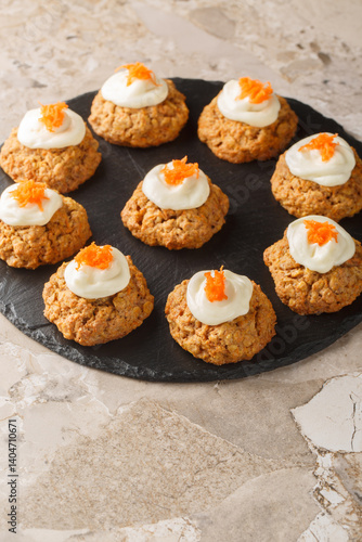 Obraz na płótnie Cream Cheese Carrot Cake Cookies close up on the plate on the table. Vertical w salonie
