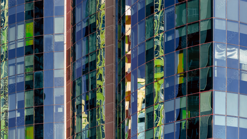 many windows and walls facade of a modern skyscraper without people many windows and walls facade of a modern skyscraper without people