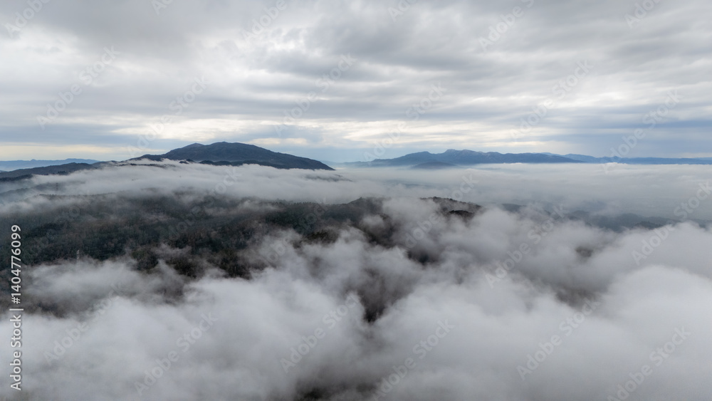 Peaks of the Carrascoy and Espuña mountain ranges above the clouds after the storm in the Region of Murcia, Spain. Peaks of the Carrascoy and Espuña mountain ranges above the clouds after the storm in the Region of Murcia, Spain.
