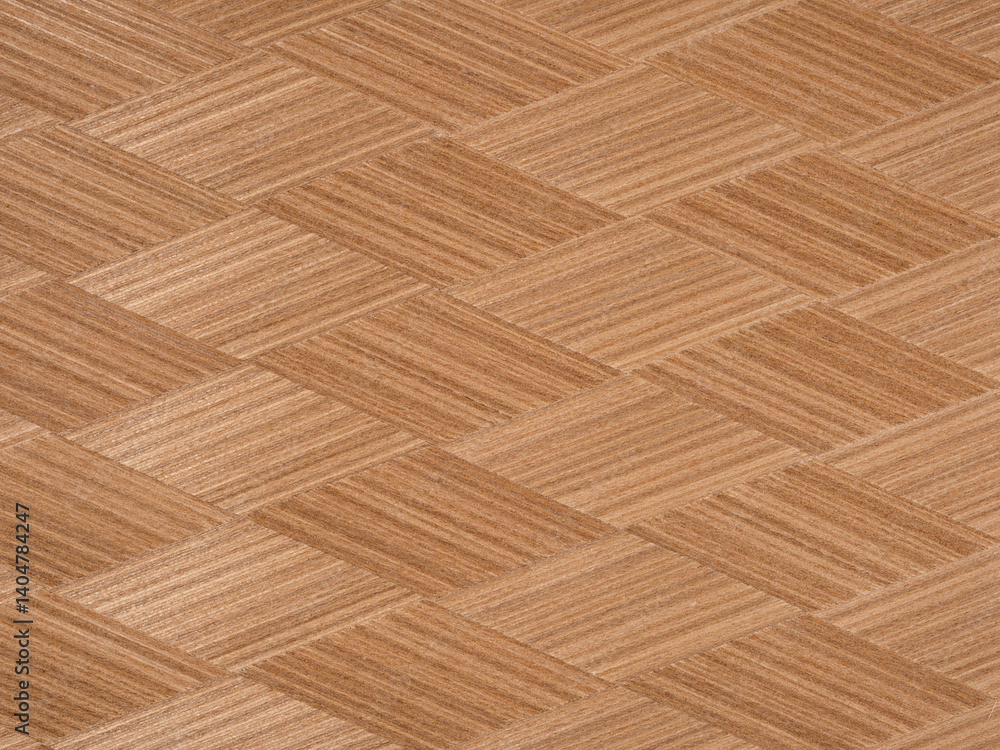 Intricate chevron pattern in natural wood veneer with rich brown hues