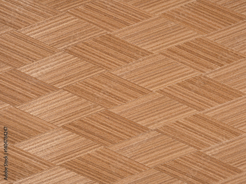 Obraz na płótnie Intricate chevron pattern in natural wood veneer with rich brown hues w salonie