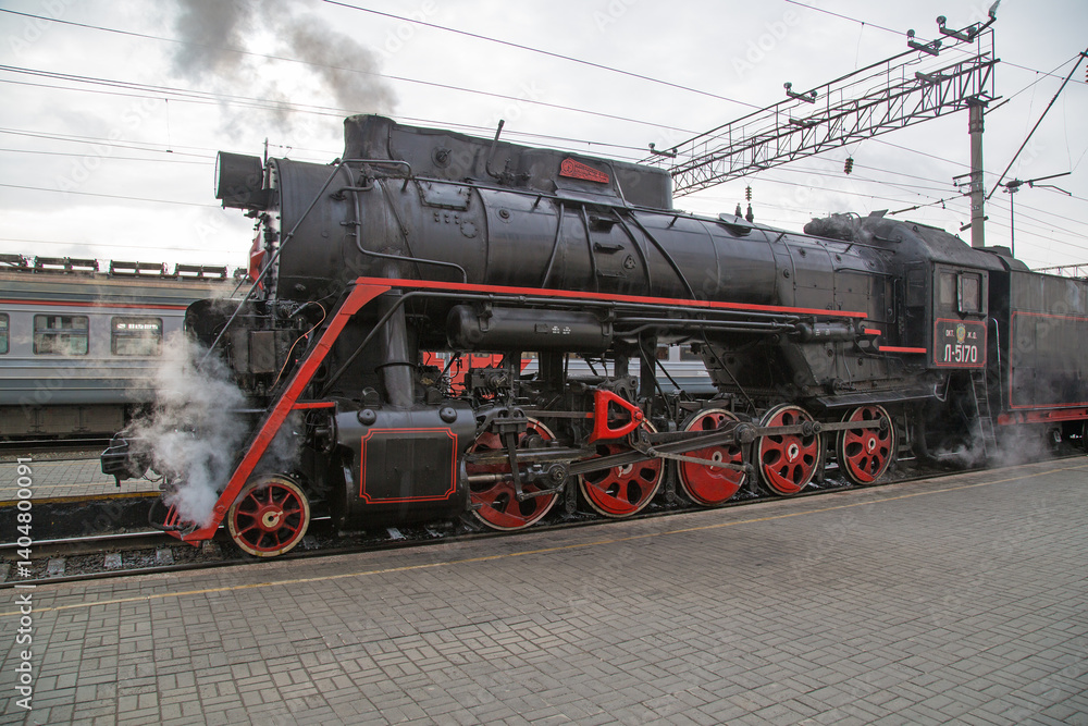 Fototapeta premium Old Soviet steam locomotive class L (L-5170) in operation. Manufactured in 1955.