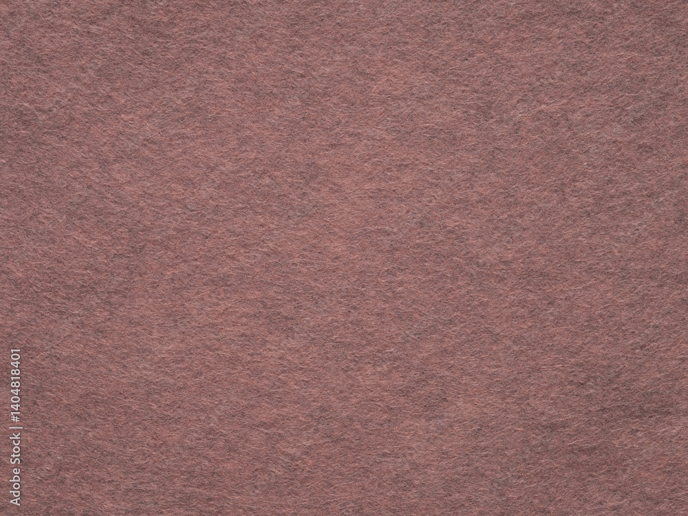 A dusky rose felt surface, echoing the subtle grace of an early twilight and the warmth of vintage charm