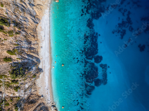 Obraz na płótnie Aerial top view of the beautiful coast of Alonissos island with remote beaches and turquoise, clear sea, Sporades, Greece w salonie