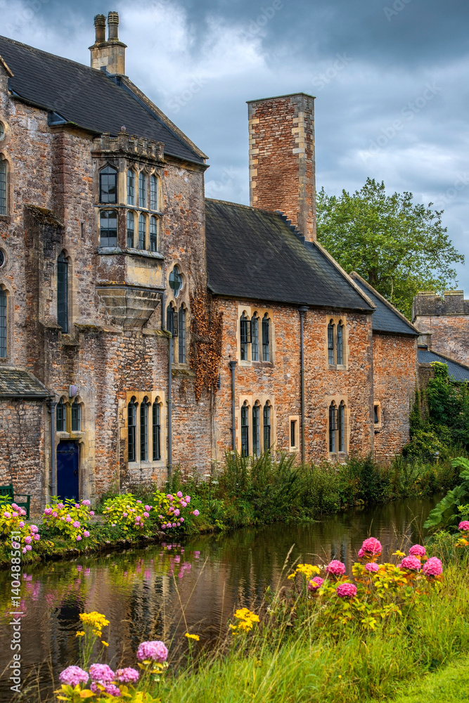 view of the Bishop's Palace from the gardens, Wells, Somerset, England, UK