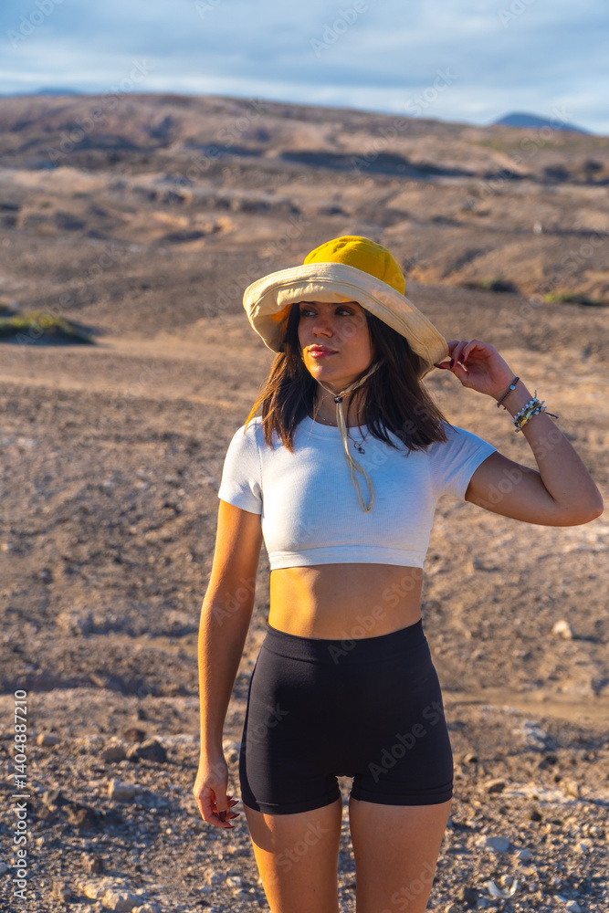 Tourist exploring volcanic landscape in gran canaria, spain
