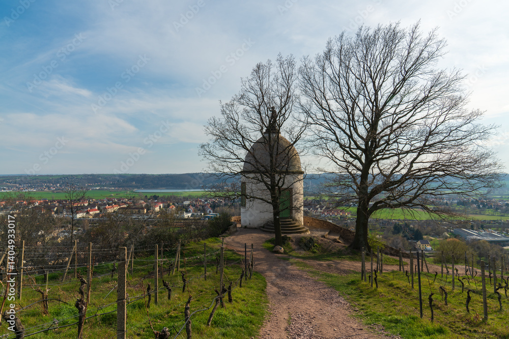An old chapel on hill in Radebeul, Germany. Historic building offering beautiful view surrounding countryside. An old chapel on hill in Radebeul, Germany. Historic building offering beautiful view surrounding countryside.