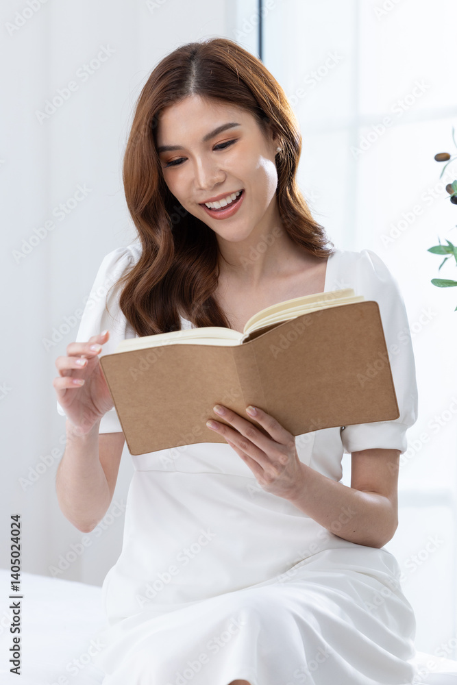 Young woman reading book in peaceful setting Young woman reading book in peaceful setting