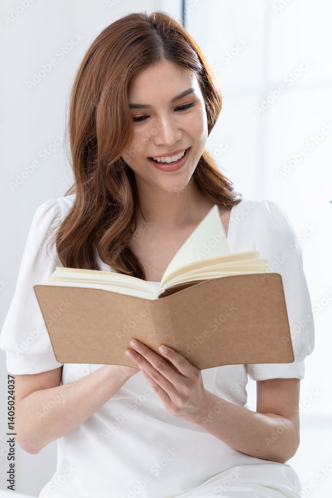 Young woman reading book in peaceful setting Young woman reading book in peaceful setting